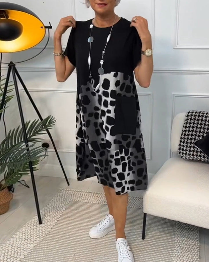 Yvonne - Robe patchwork noire à encolure ronde