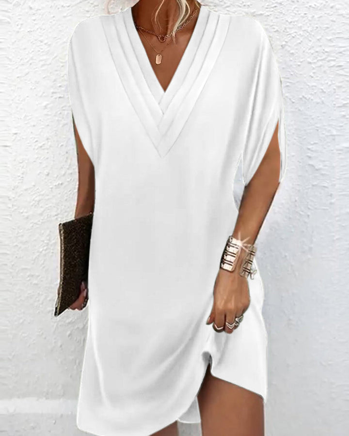 Tina - Elegantes, einfarbiges Kleid mit Schlitzärmeln