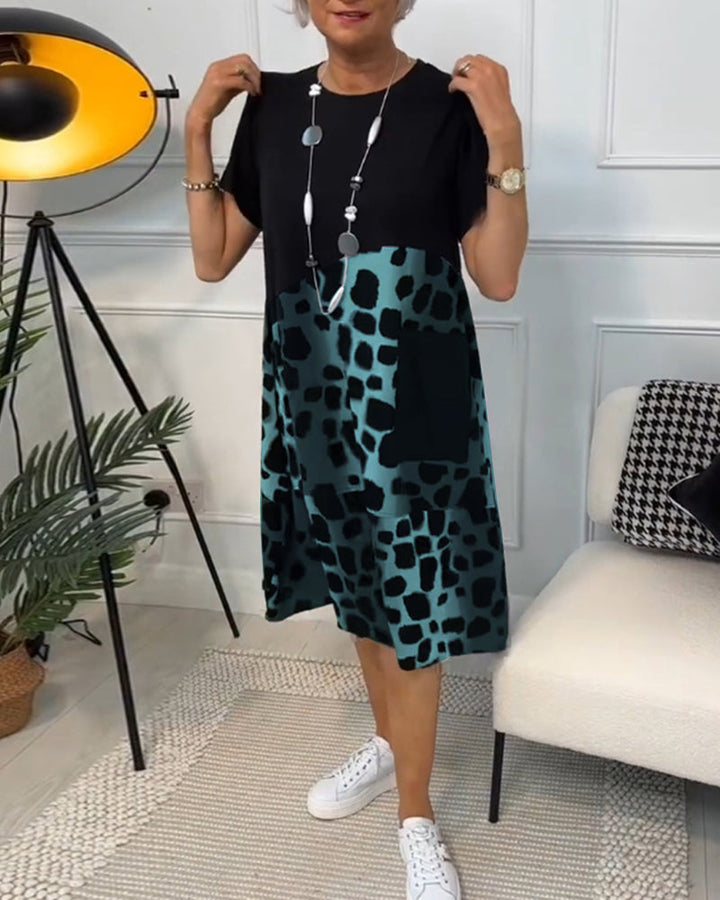 Yvonne - Robe patchwork noire à encolure ronde