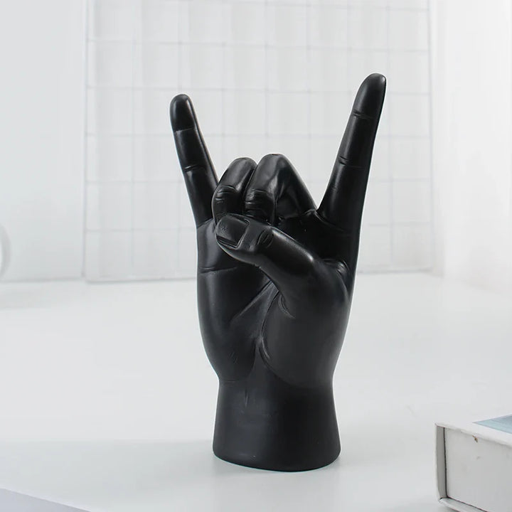 Lass uns rocken Handgeste