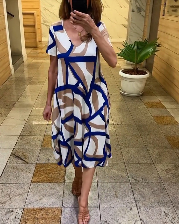 Delia - Elegantes Kleid mit geometrischem Muster