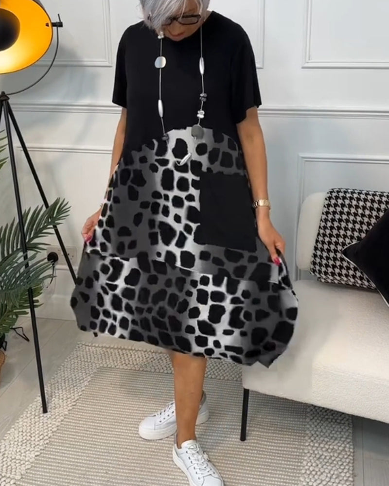 Yvonne - Robe patchwork noire à encolure ronde