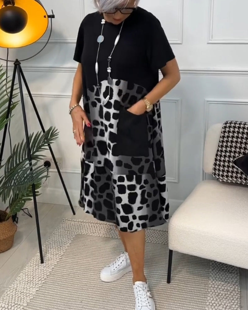 Yvonne - Robe patchwork noire à encolure ronde