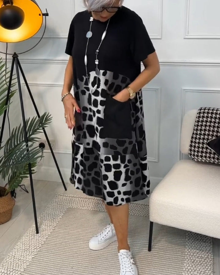 Yvonne - Robe patchwork noire à encolure ronde