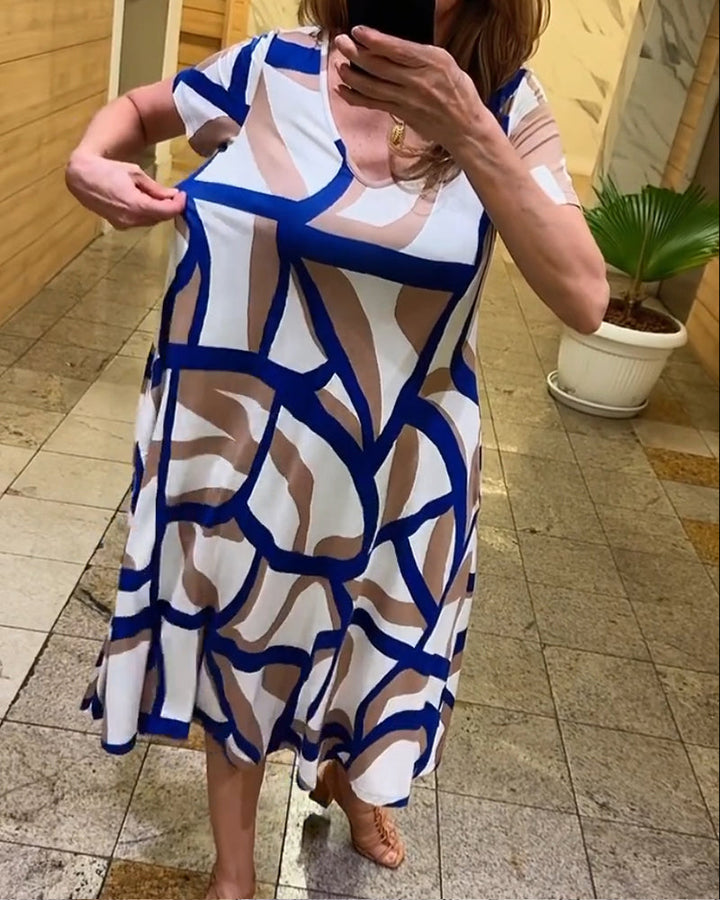 Delia - Elegantes Kleid mit geometrischem Muster